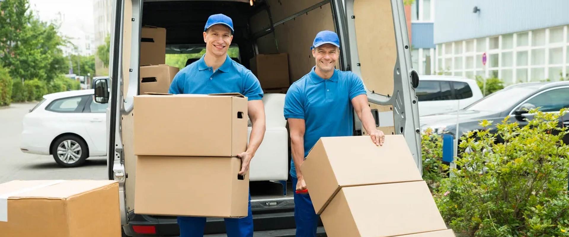 Men carrying boxes for emergency part delivery