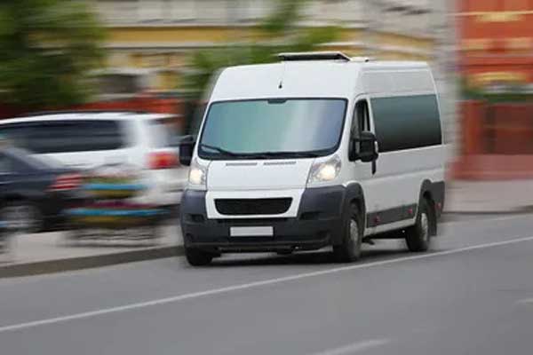 White van driving in Las Vegas for same-day delivery